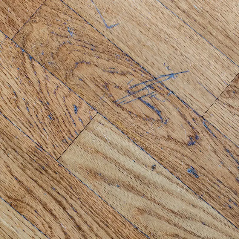 Minor scuffs on hardwood floors